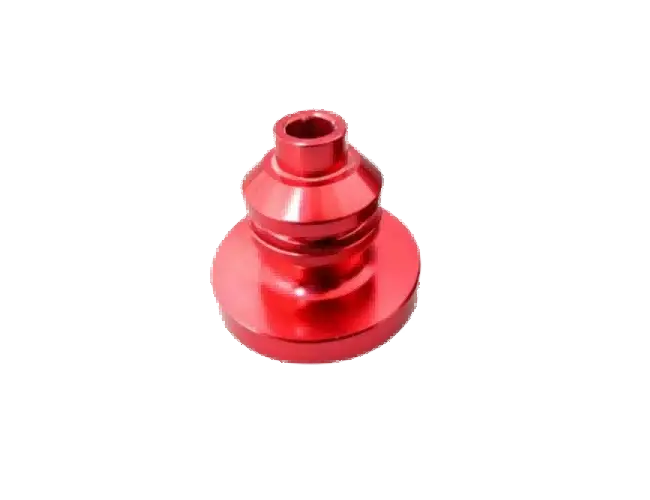 Red anodized aluminum precision component with corrosion-resistant surface finish